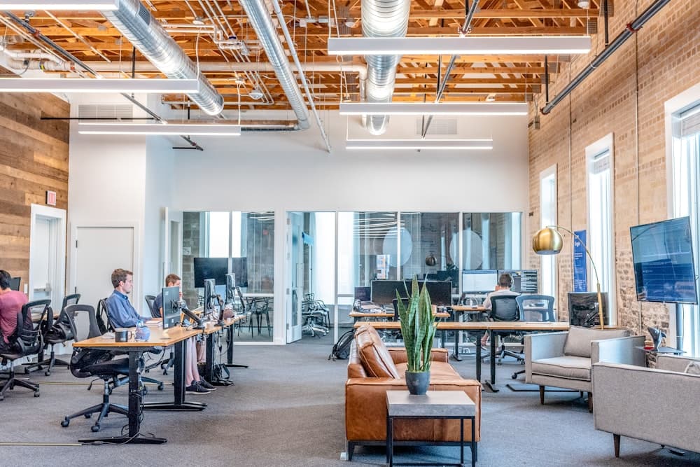 An open-plan office with people working at desks